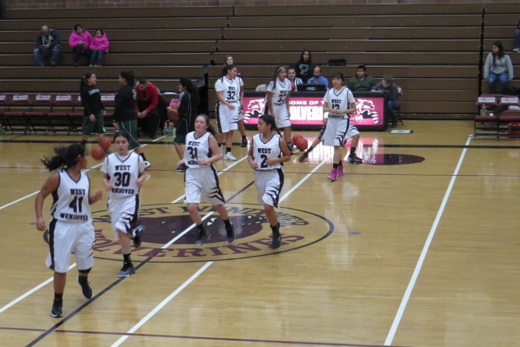 WWHS Girls basketball with coach Tyler Peterson