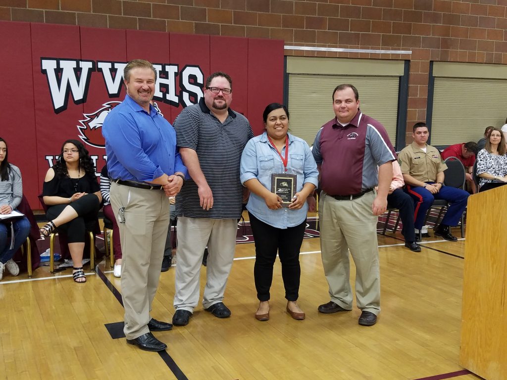 L to R: Principal Craig Killonen, Vice-principal Mike Condie, Miss Lysette Perez, and Mr. Tyler Peterson