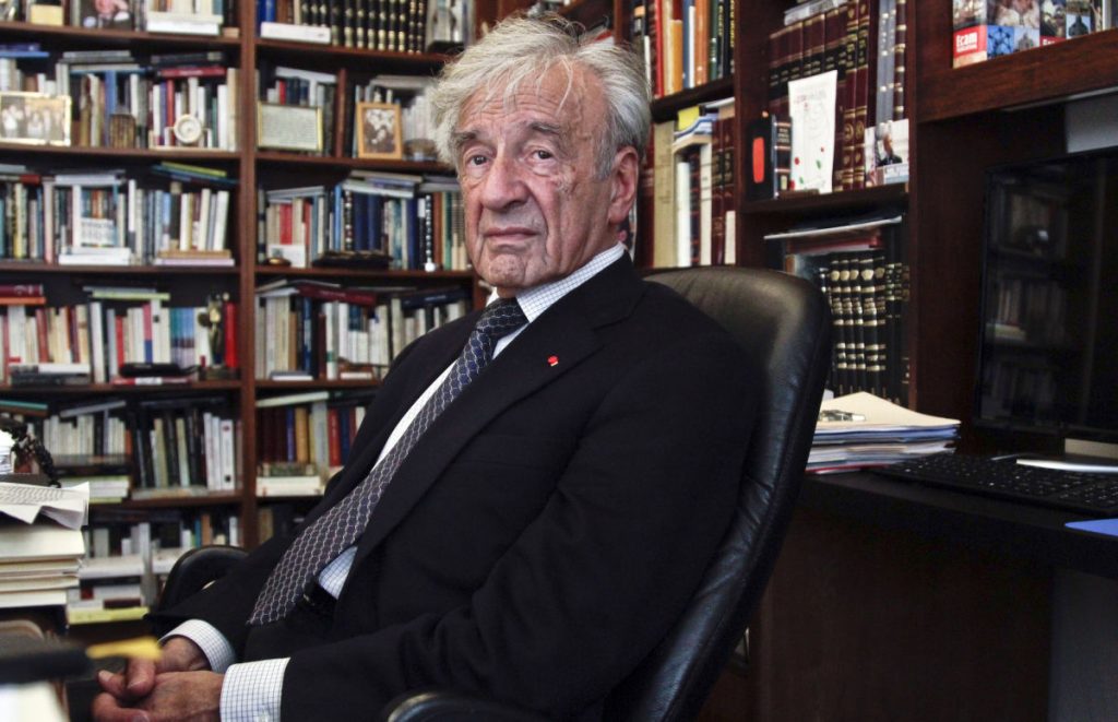 This Sept. 12, 2012, photo shows Holocaust activist and Nobel Peace Prize recipient Elie Wiesel, 83, in his office in New York. Weisel's latest book is titled, "Open Heart." (AP Photo/Bebeto Matthews)