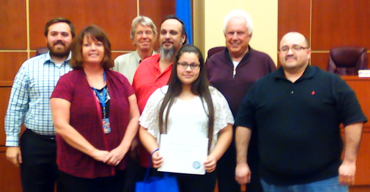 Front row from left: Councilwoman Jasie Holm, Youth Award recipient Fatima Chihuahua, Councilman Nick Flores Back rowfrom left: Mayor Daniel Corona, Jerry Anderson, Izzy Gutierrez, John Hanson, (Photo High Desert Advocate)